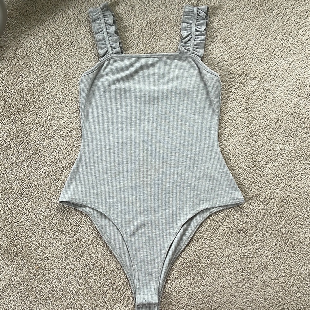 Gray body suit